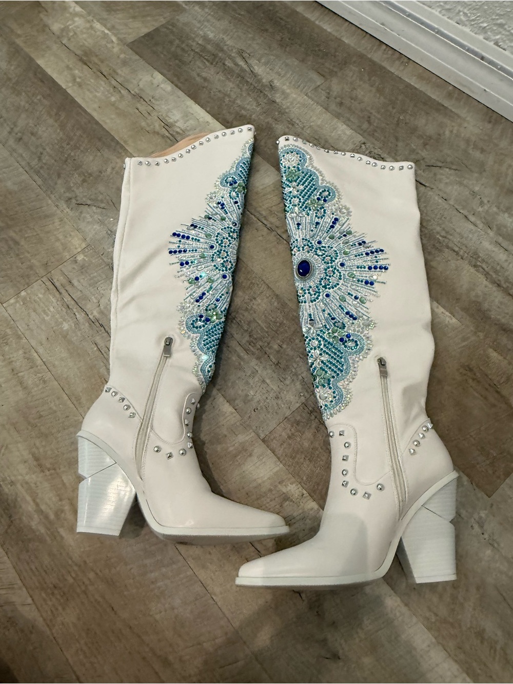 Women’s White Knee-High Heeled Boots with Blue Embellished Detail